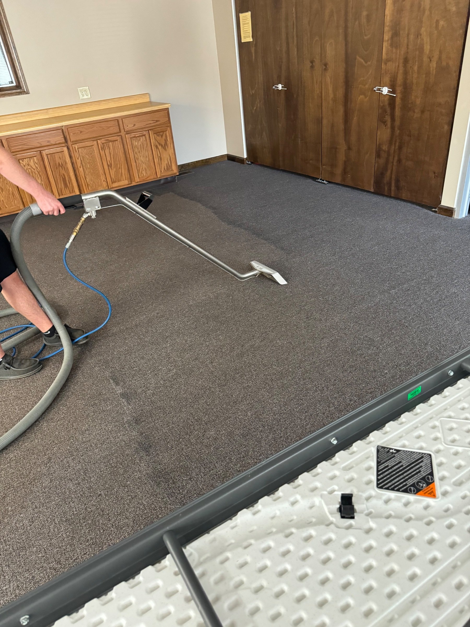 A wet lane through office carpet by Sennings Cleaning Services, Inc. Springfield