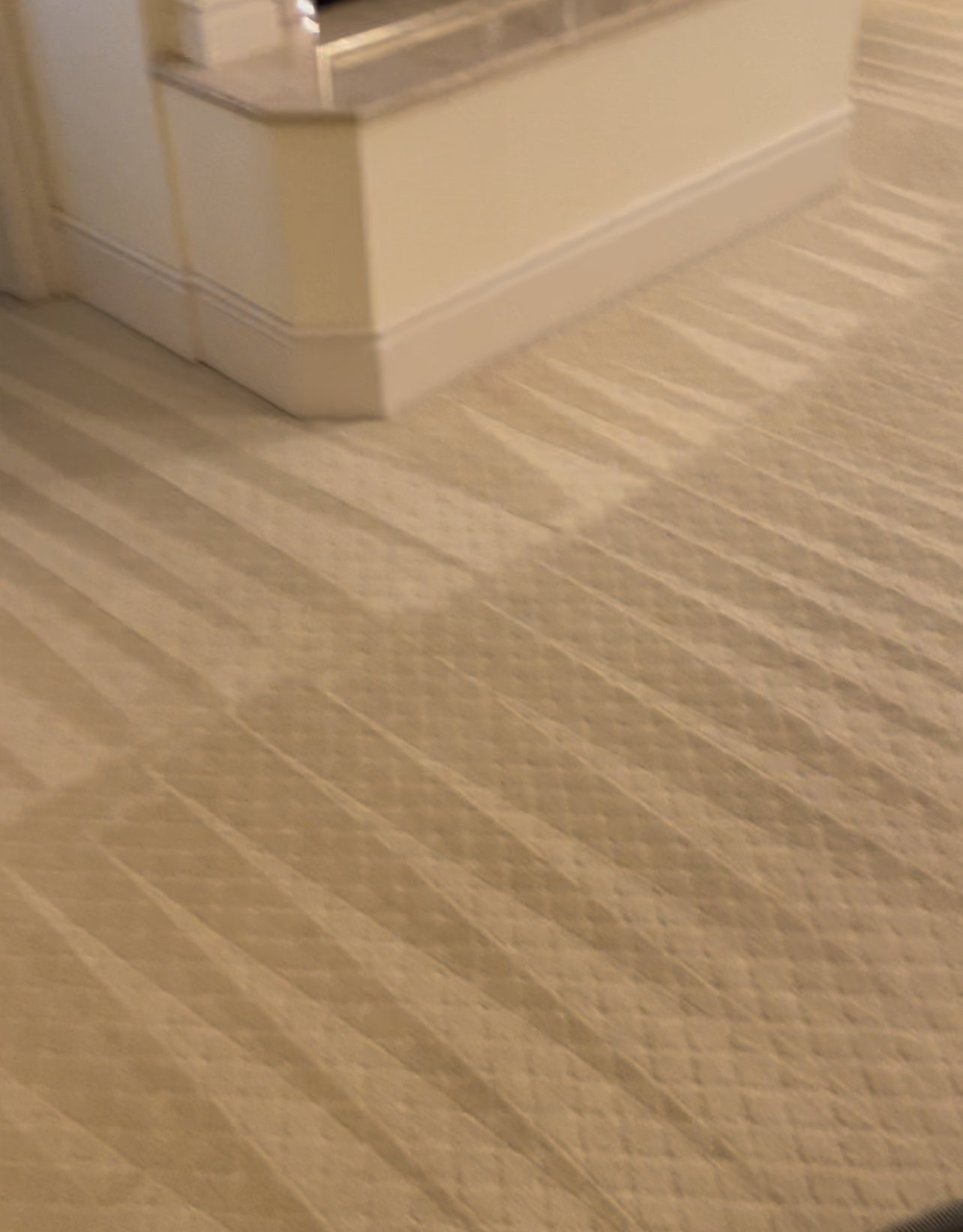 Pile lifted along a hallway edge by Sennings Cleaning Services, Inc. Springfield